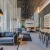 a lounge with seating and tables