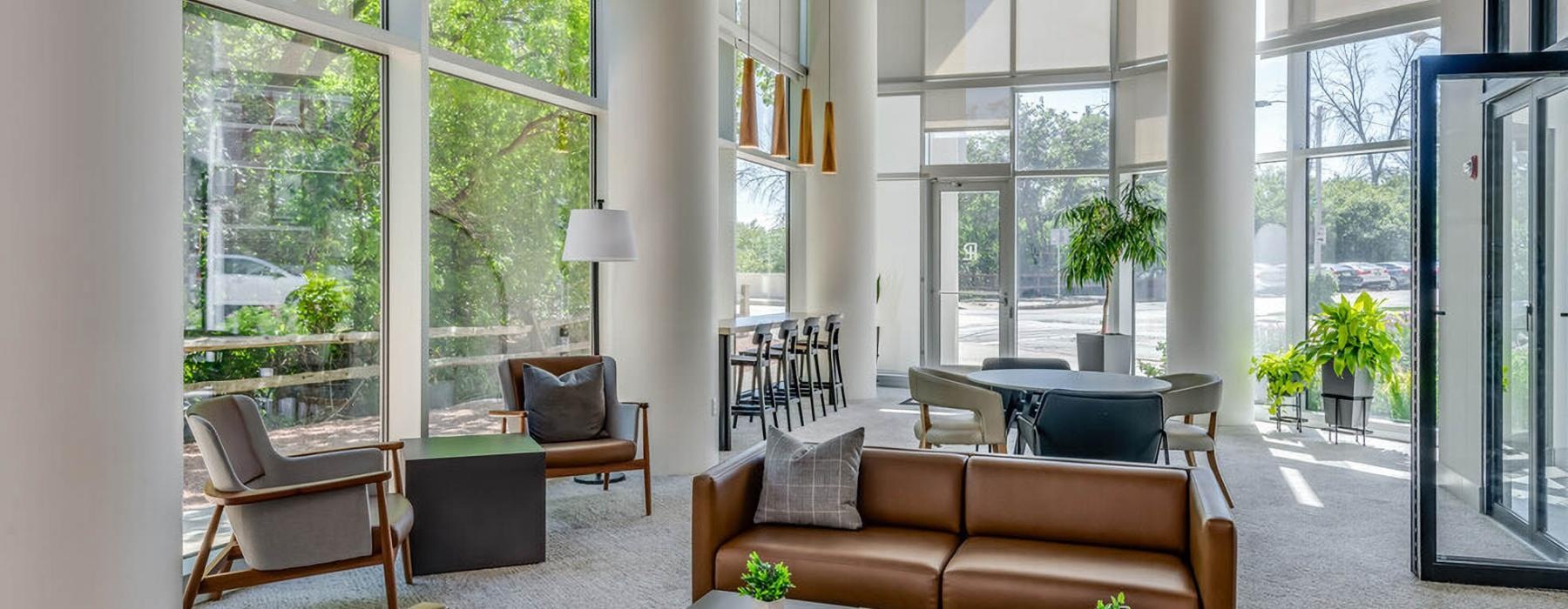 a lounge with large windows