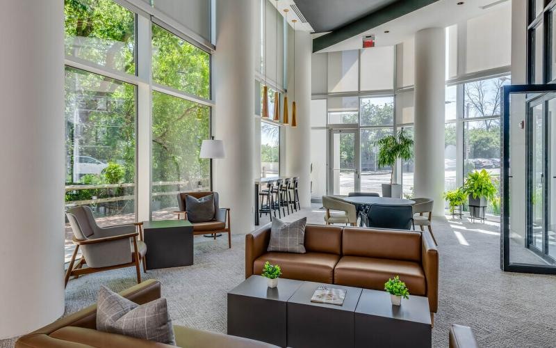a lounge with large windows