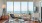 a living room with large windows