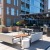 a courtyard with benches and tables
