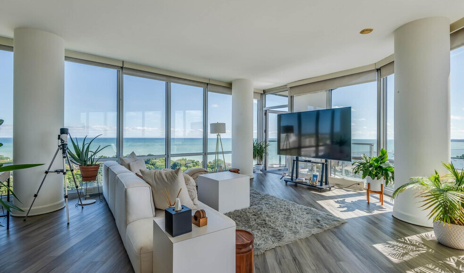 a living room with large windows