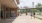 people walking on a sidewalk