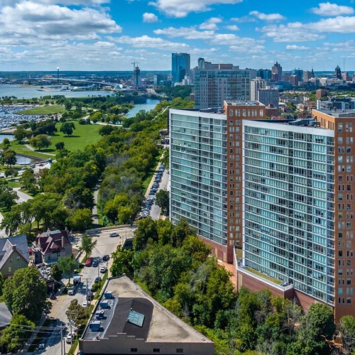 a city with tall buildings and trees