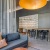 a room with a couch and a table with chairs